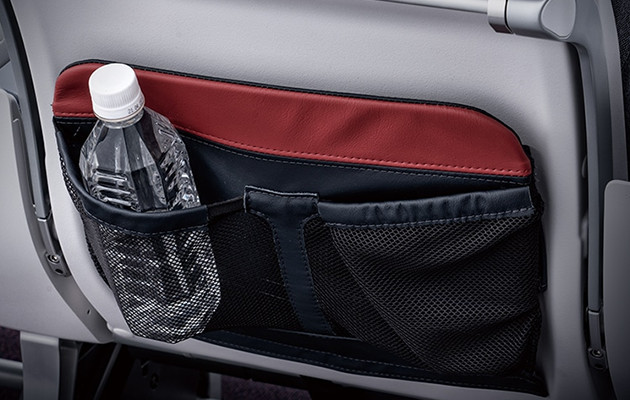 Net pocket for personal item storage